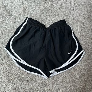 Black Nike lined running shorts. Size medium